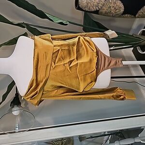 Gold one shoulder body suit